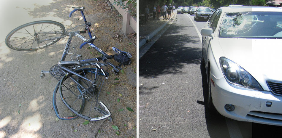 wrecked bike and car - accident scene