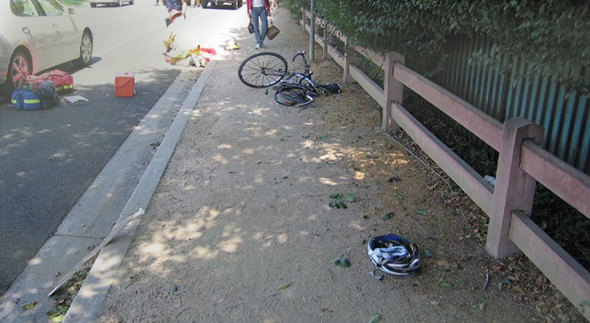 bicycle + car accident scene