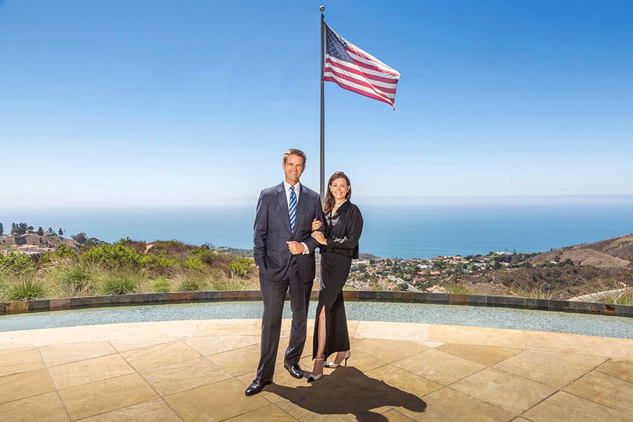 Photo of Mark and Michelle with the flag
